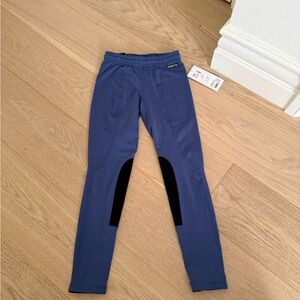 kerrits girls riding pants in blue with black knee pads